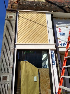 angled beadboard above left window